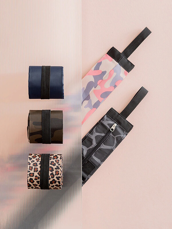 Colorful and patterned sports shoulder bags for women, featuring camouflage, leopard, and solid designs, perfect for fitness and beach days.